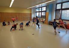 Sportík s trenérkou házené