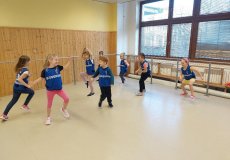 Sportík s trenérkou házené