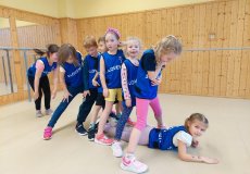 Sportík s trenérkou házené