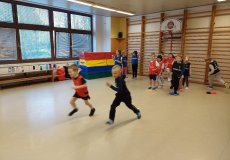 Sportík s trenérkou házené