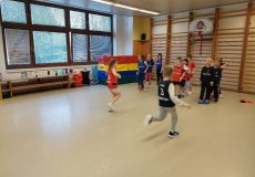 Sportík s trenérkou házené