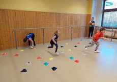 Sportík s trenérkou házené