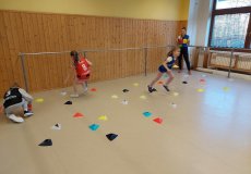 Sportík s trenérkou házené