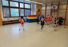 Sportík s trenérkou házené