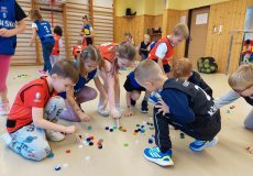 Sportík s trenérkou házené